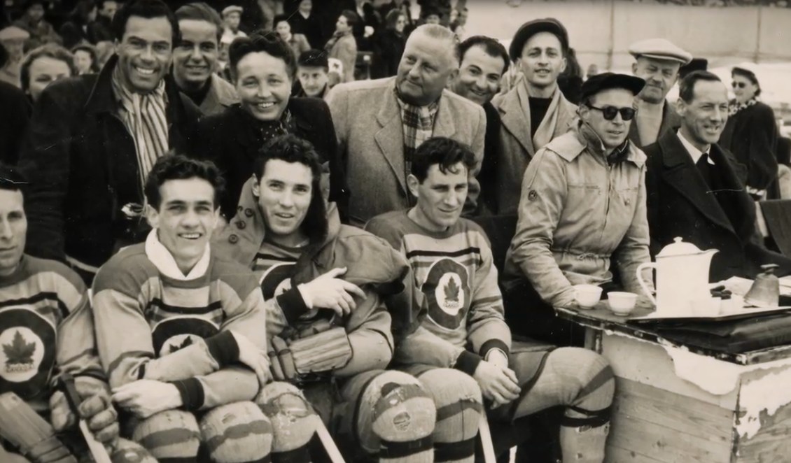 Photo:  RCAF Flyers vs Swiss National Team in Davos Switzerland- note tea service at photo right